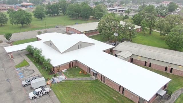 Commercial roof coating by DXT Roofing