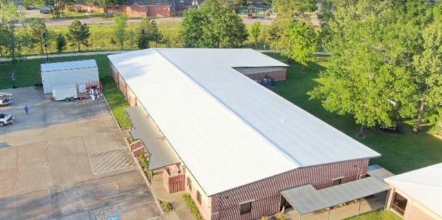 Commercial roof coating by DXT Roofing